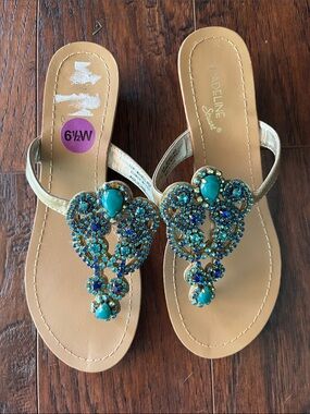 Madeline Stuart Gold Sandals with Teal and Blue Jewel Accents